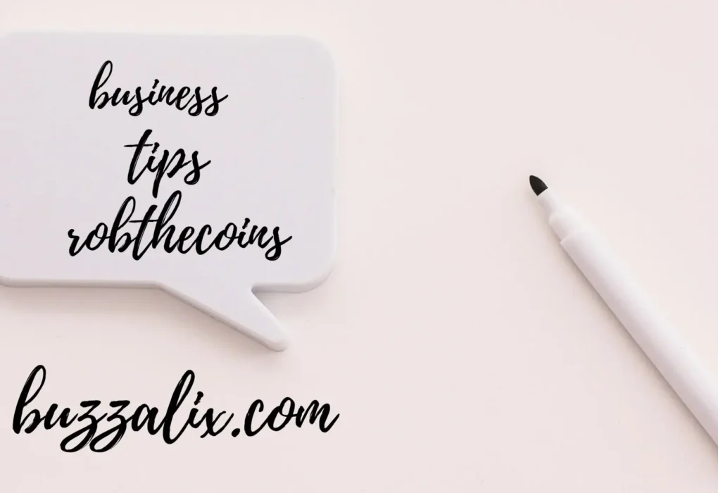 Entrepreneur analyzing growth charts and applying Business Tips Robthecoins strategies for smart success and better business performance